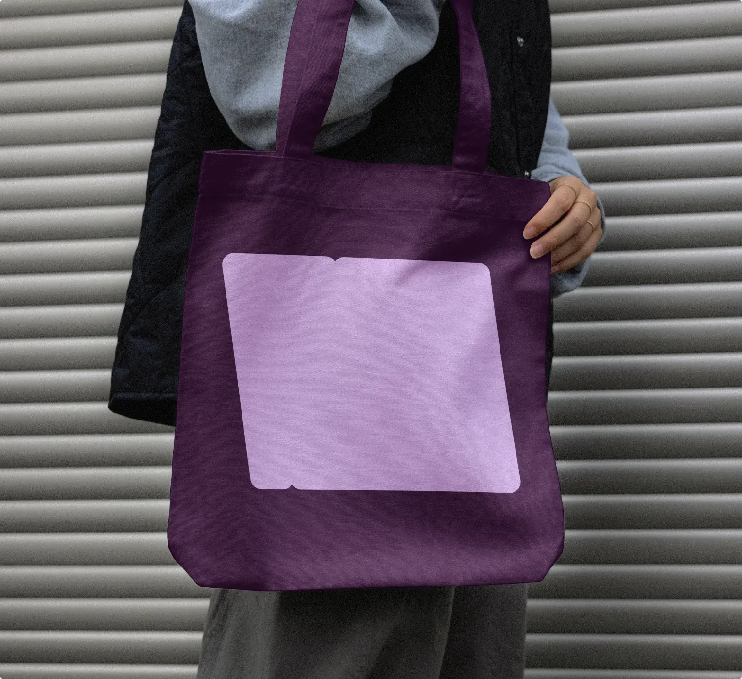 A purple Venture Atlanta tote bag carried over the shoulder.