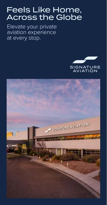 A tall Signature Aviation banner of a terminal at dusk, "Feels Like Home, Across the Globe."