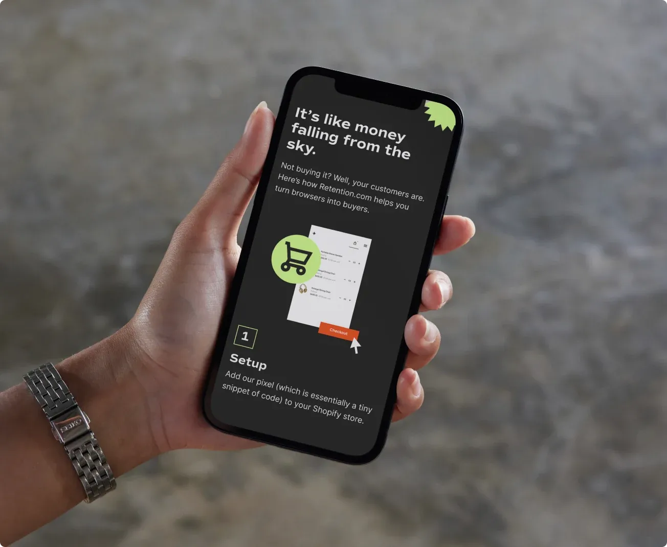 A hand holding a phone open on Retention.com: "It’s like money falling from the sky."