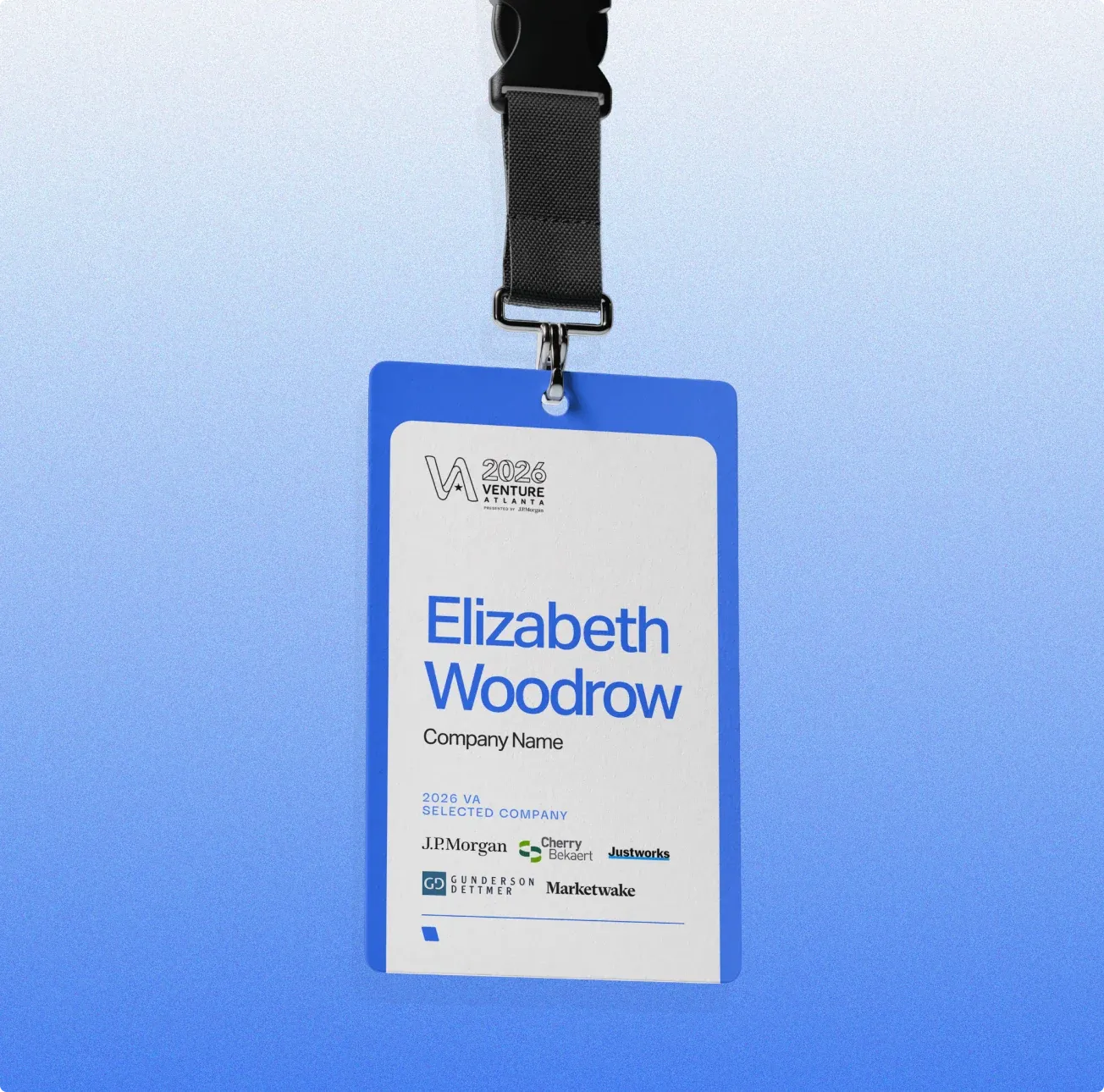 A Venture Atlanta 2026 selected company name tag on a lanyard, against a blue gradient.